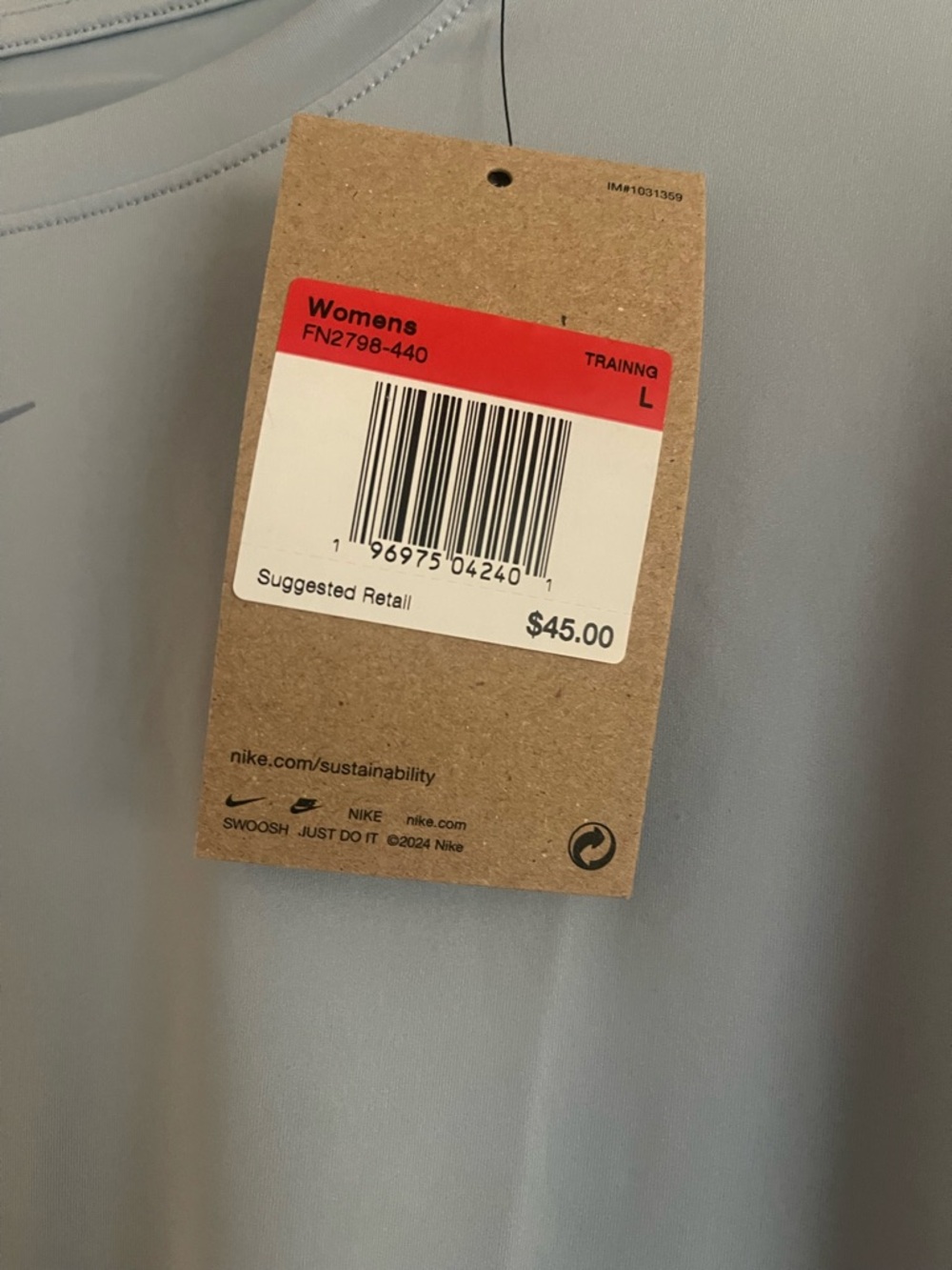 Nike women’s  Light dusty Blue Short Sleeve Dri-FIT Training Tee - Picture 2 of 4